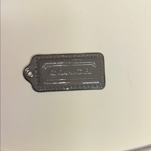Coach Handbags - Coach Metallic Gray Leather Tag